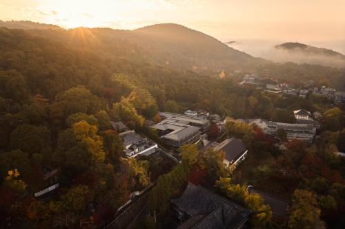 an aerial view of a building in a forest at Banyan Tree Higashiyama Kyoto in Kyoto