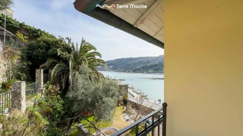 a view of the water from a balcony of a house at La Galleria del Tempo, Terre Marine in Portovenere