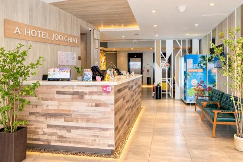 a hotel lobby with a hotel lobby clinic at A Hotel Joo Chiat in Singapore