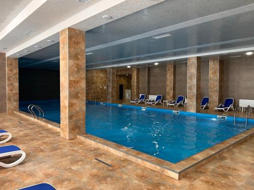 Swimmingpoolen hos eller tæt på Alvina 103