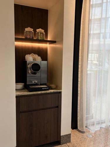 Kuchyň nebo kuchyňský kout v ubytování Hotel Pax