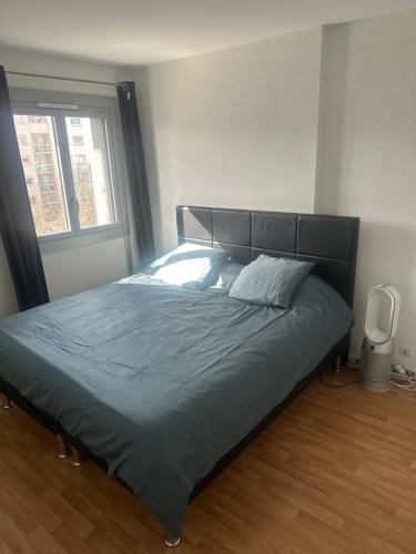 Llit o llits en una habitació de Le Petit Cocoon