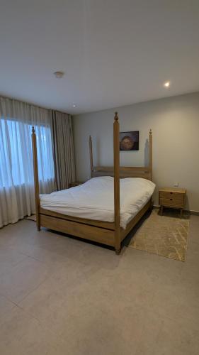 Katil atau katil-katil dalam bilik di Kisima apartments