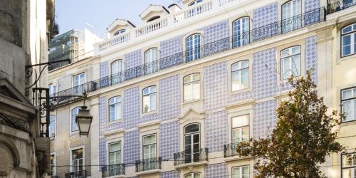 a building with blue and white tiles on it at LSA Baixa Castelo by Numa in Lisbon