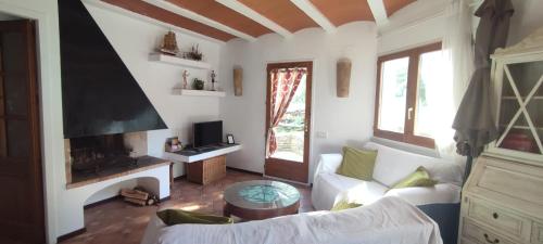 Casa amb encant i una àmplia sortida al jardí