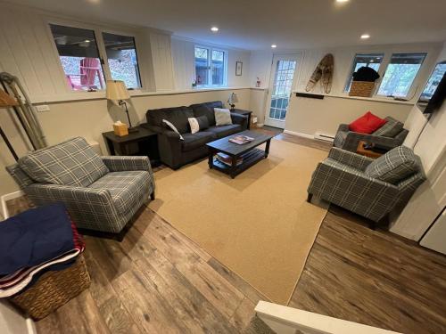an aerial view of a living room with furniture at SKI Bike, Hike & Golf Townhouse w/ Hot tub in Ellicottville
