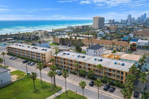 an aerial view of a hotel and the ocean at Max Walkable Location 1st Floor 2 Patios in South Padre Island