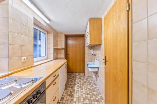 a bathroom with a sink and a toilet at Monteurapartments in Heidenheim NEU Küche Smart TV WIFI in Heidenheim an der Brenz