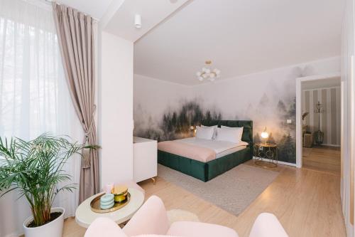 a bedroom with a bed and a living room at Sovata Apartment in Sovata