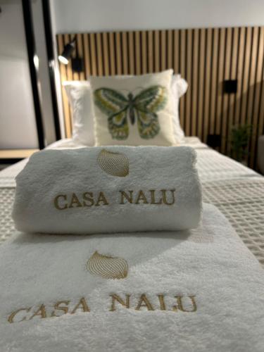 Llit o llits en una habitació de Casa Nalu
