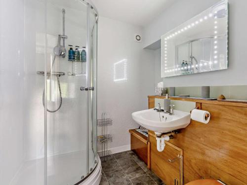 a bathroom with a glass shower and a sink at 1 Bed in Elgin oc-94281 in Elgin