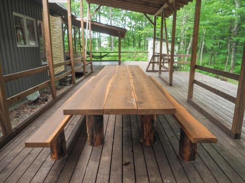 a wooden bench on a porch of a house at Nasu-gun - House - Vacation STAY 9032 in Anazawa