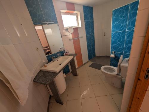 Koupelna v ubytování Questel BronQ