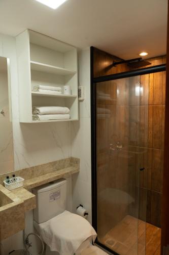 a bathroom with a shower and a toilet at Imperial Hotel in Imperatriz
