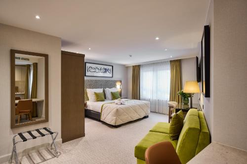 Postel nebo postele na pokoji v ubytování Hotel Aragon