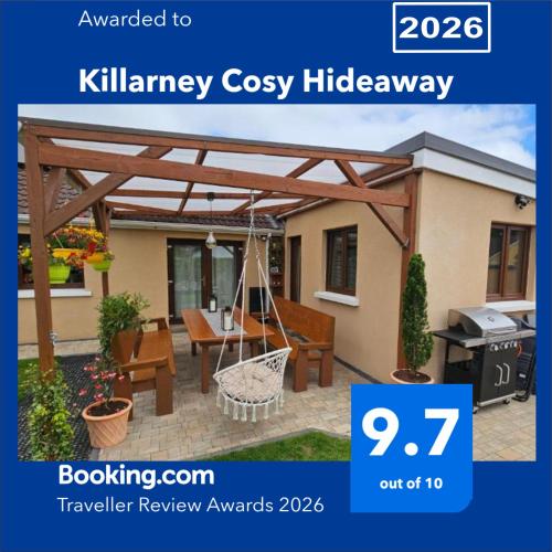 a picture of a patio with a wooden pergola at Killarney Cosy Hideaway in Killarney