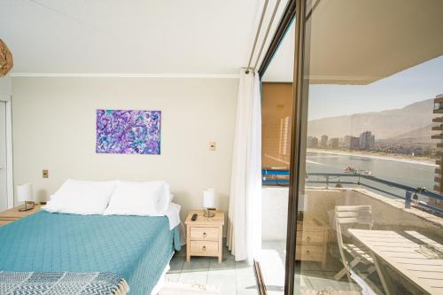 Posteľ alebo postele v izbe v ubytovaní Edificio Royal Marine