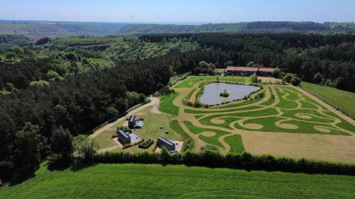 an aerial view of a large estate with a garden at Middlehead Cottages in Pickering