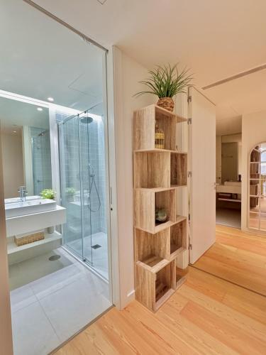 a bathroom with a shower and a sink at DLux Terrace Cond Bayline Pool & SPA in Armação de Pêra