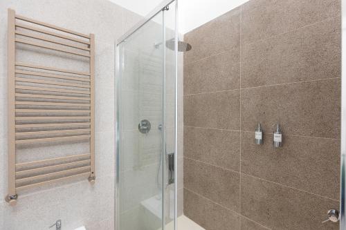 Foto ARIOSTO'S Luxury Rooms 5