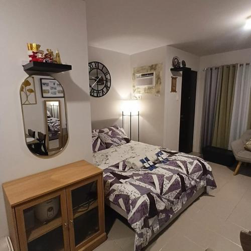 Comfy Walk-Up Studio minutes from Mactan Airport with WiFi & Netflix