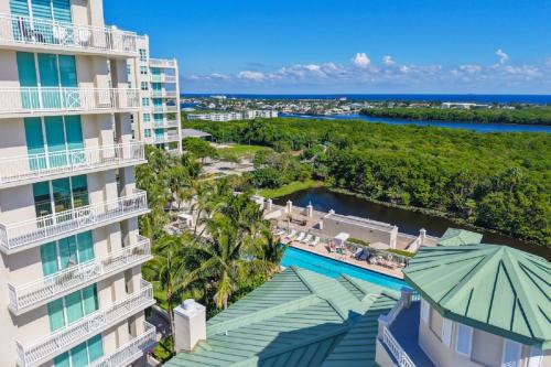 an aerial view of a hotel and a resort at 314S Nautical Beach Suite - 2 Beds!, Pools, Jacuzzi, Beach, Shops & Dog Friendly in Boynton Beach