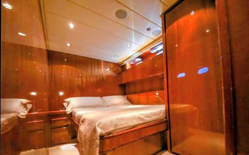 a small bed in the back of a boat at Private Yacht Monaco in Monte Carlo