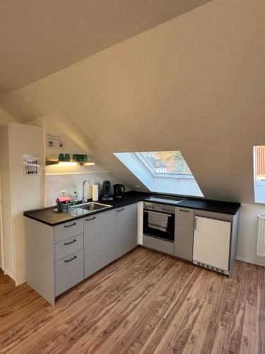 a kitchen with a sink and a counter top at Wohnung in Kirchheim in Kirchheim unter Teck