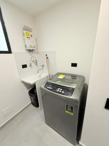 a laboratory with a sink and a fax machine at New studio, exceptional location with parking in Santa Rosa de Cabal