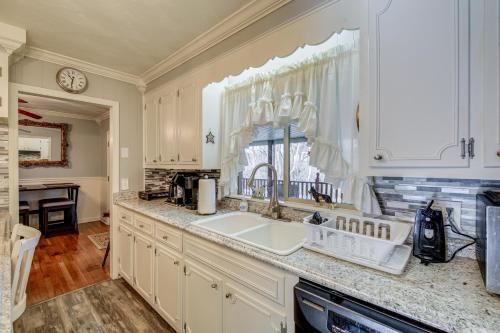 a kitchen with a sink and a window at Bristol Retreat with Creek Access 2 Mi to Dtwn in Bristol