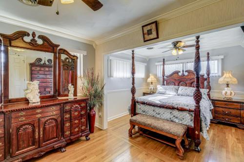 a bedroom with a canopy bed and a dresser at Bristol Retreat with Creek Access 2 Mi to Dtwn in Bristol
