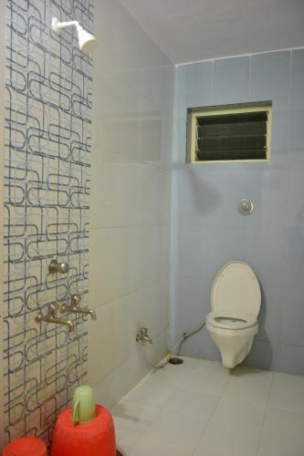 Koupelna v ubytování Hotel Sai Vishwa