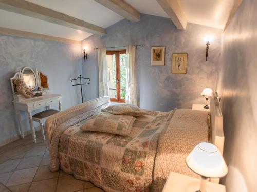 Llit o llits en una habitació de Orchidée