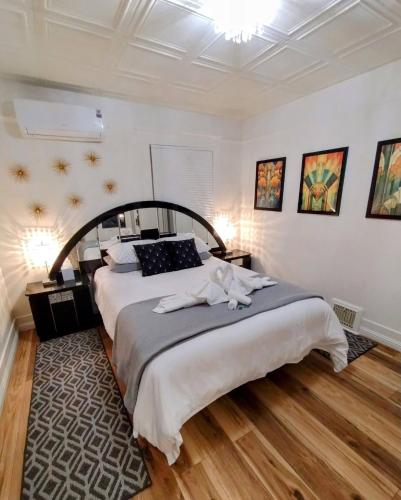 a bedroom with a large bed in a room at Deco Studio Retreat with Fireplace, WiFi, Queen Bed in Reno
