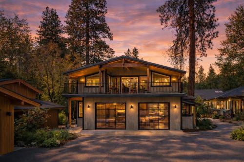 a house with a lot of windows at Riverside Loft Suite home in Leavenworth