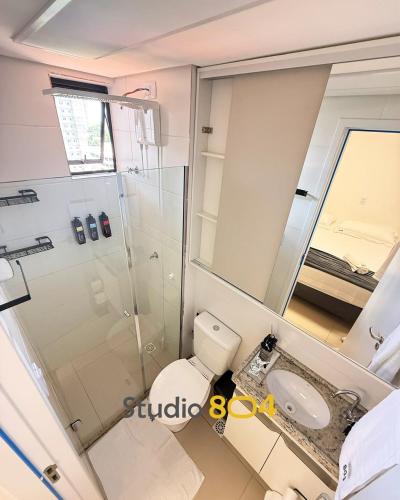 a bathroom with a shower and a toilet and a sink at Studio Connect Life in Teresina