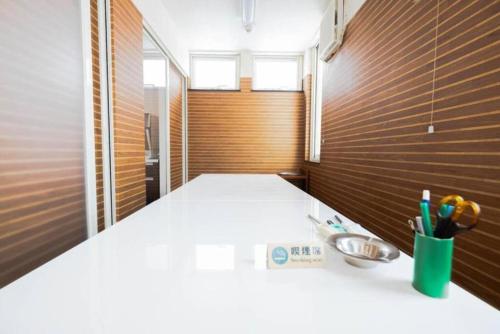 a bathroom with a counter with a sink in it at STAY IN TOYOOKA in Asahikawa