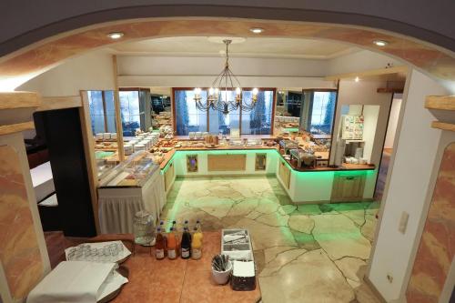 an overhead view of a kitchen in a store at Arthotel ANA Panorama, Trademark Collection by Wyndham in Marktoberdorf