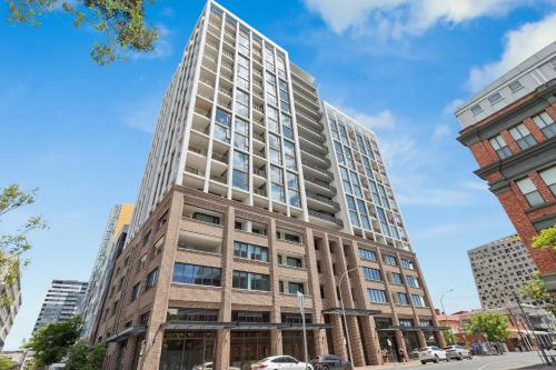 an artist rendering of the building planned for the corner of eighth and market streets at The Cullinan Apartments by CLLIX in Adelaide