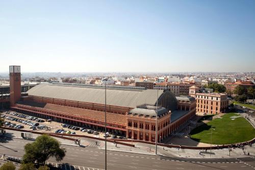 an aerial view of a building with a parking lot at 60 Balconies Art in Madrid