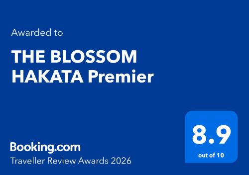 a blue sign that reads the blossom haka premier at THE BLOSSOM HAKATA Premier in Fukuoka