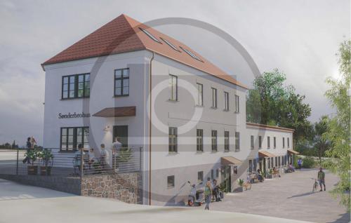 a building with people standing outside of it at Lovely Apartment In Ribe With Wifi in Ribe