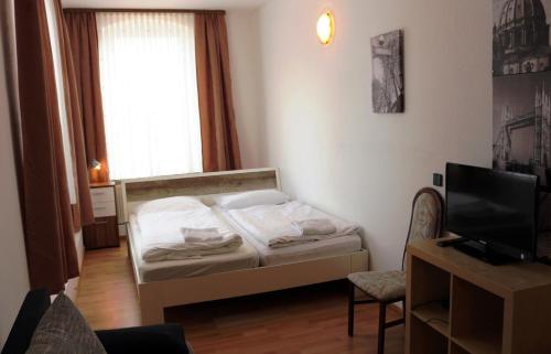 Tempat tidur dalam kamar di Landgasthof Schönecke