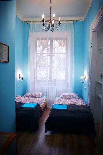 Postel nebo postele na pokoji v ubytování Hostel u Kmity