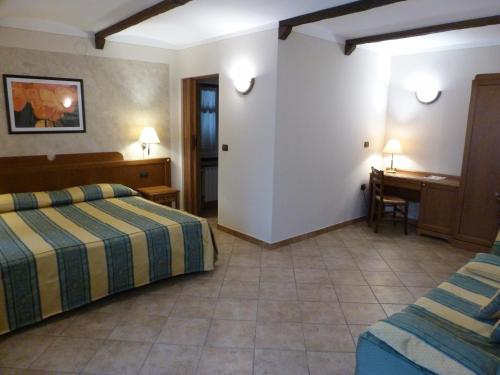 Posteľ alebo postele v izbe v ubytovaní La Cascina Di Villa Due