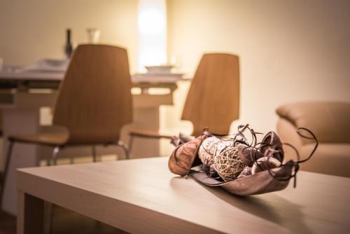 a wooden table with a basket on top of it at Chalet Cecile in Interlaken