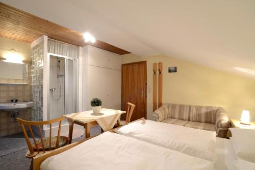 Ein Bett oder Betten in einem Zimmer der Unterkunft Ferienwohnung Nussbaumer