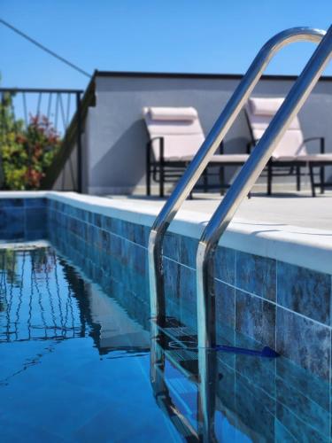 Residence Number XI - Beachfront Luxury Apartments with Pool