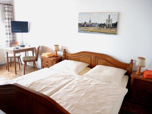 Cama ou camas em um quarto em Hotel Alte Münze
