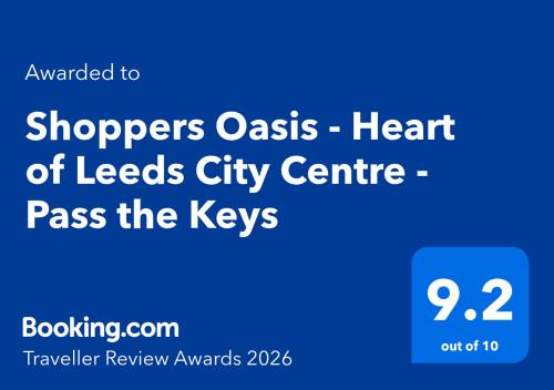 a blue sign with the words shoppers oaks heart of leeks city centre pass at Shoppers Oasis - Heart of Leeds City Centre - Pass the Keys in Leeds